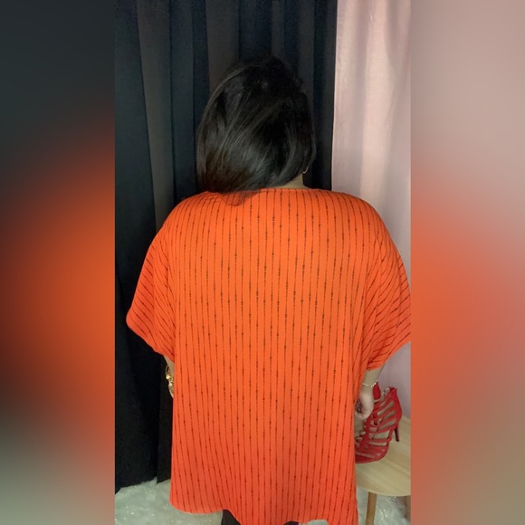 Orange and black top perfect fit my plus size divas. Size 3x. - Picture 4 of 4